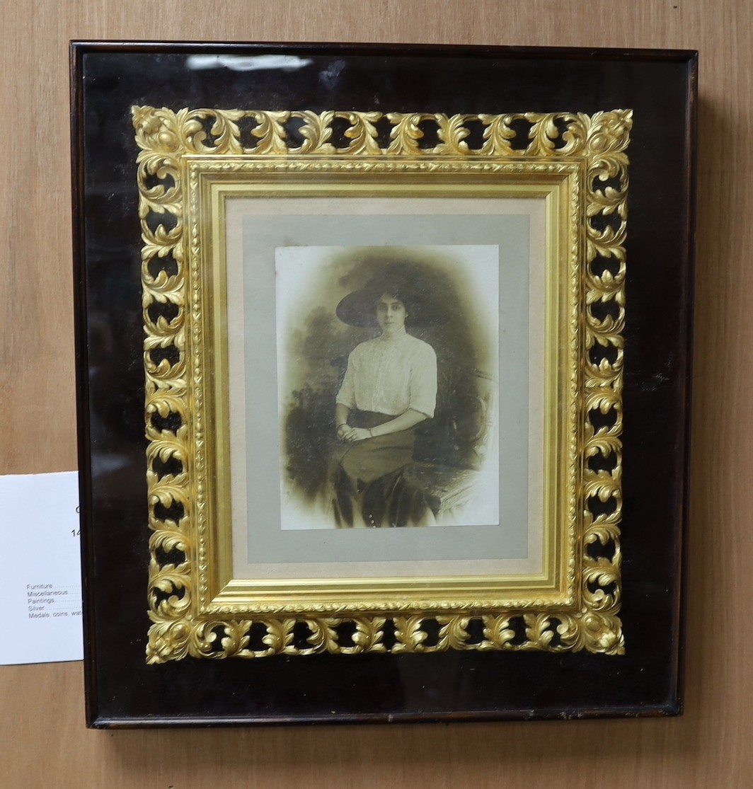 A photographic print of a Victorian lady in ornate gilt frame, 51 x 46cm overall